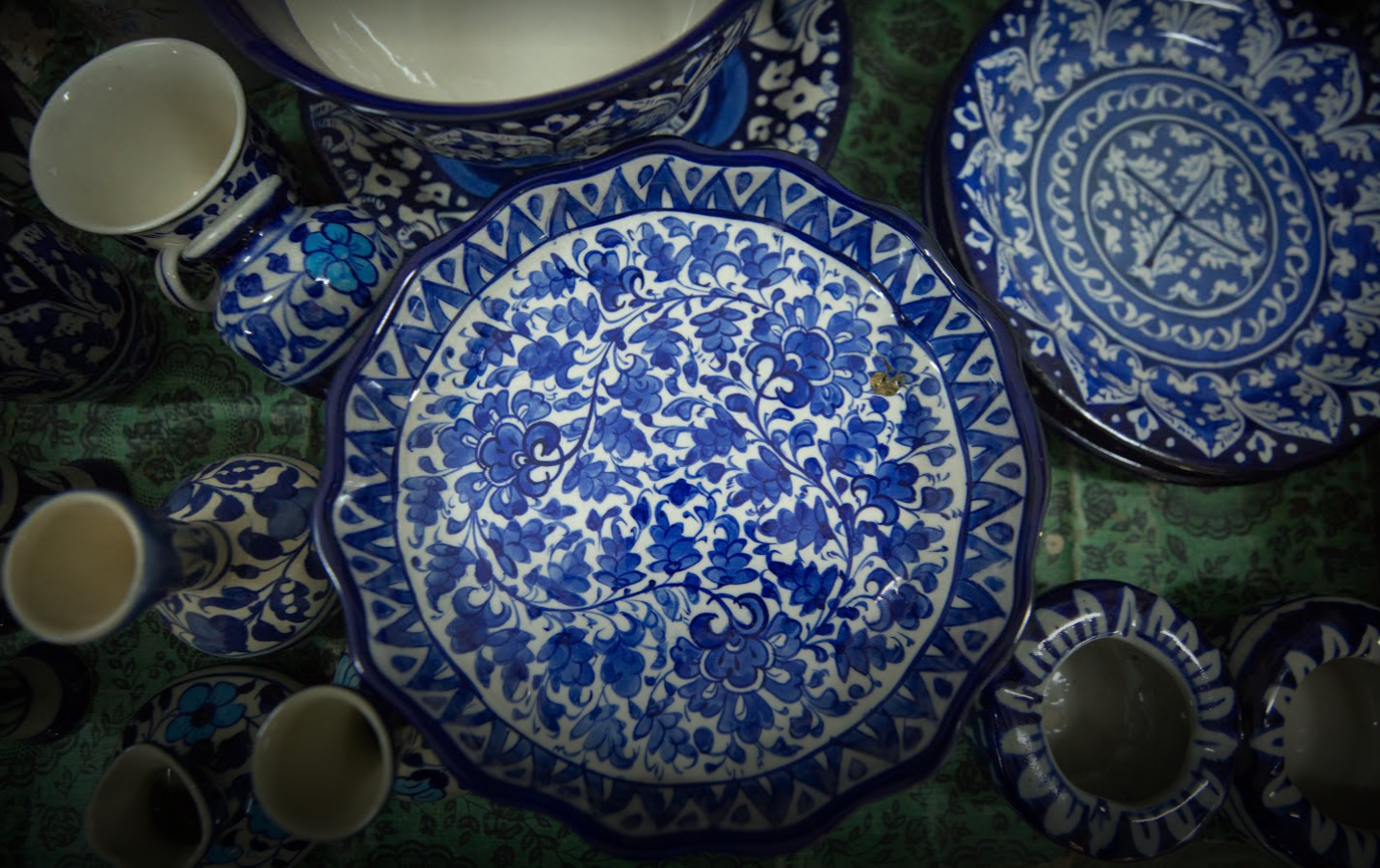 Hand-painted floral plate, cups and bowls