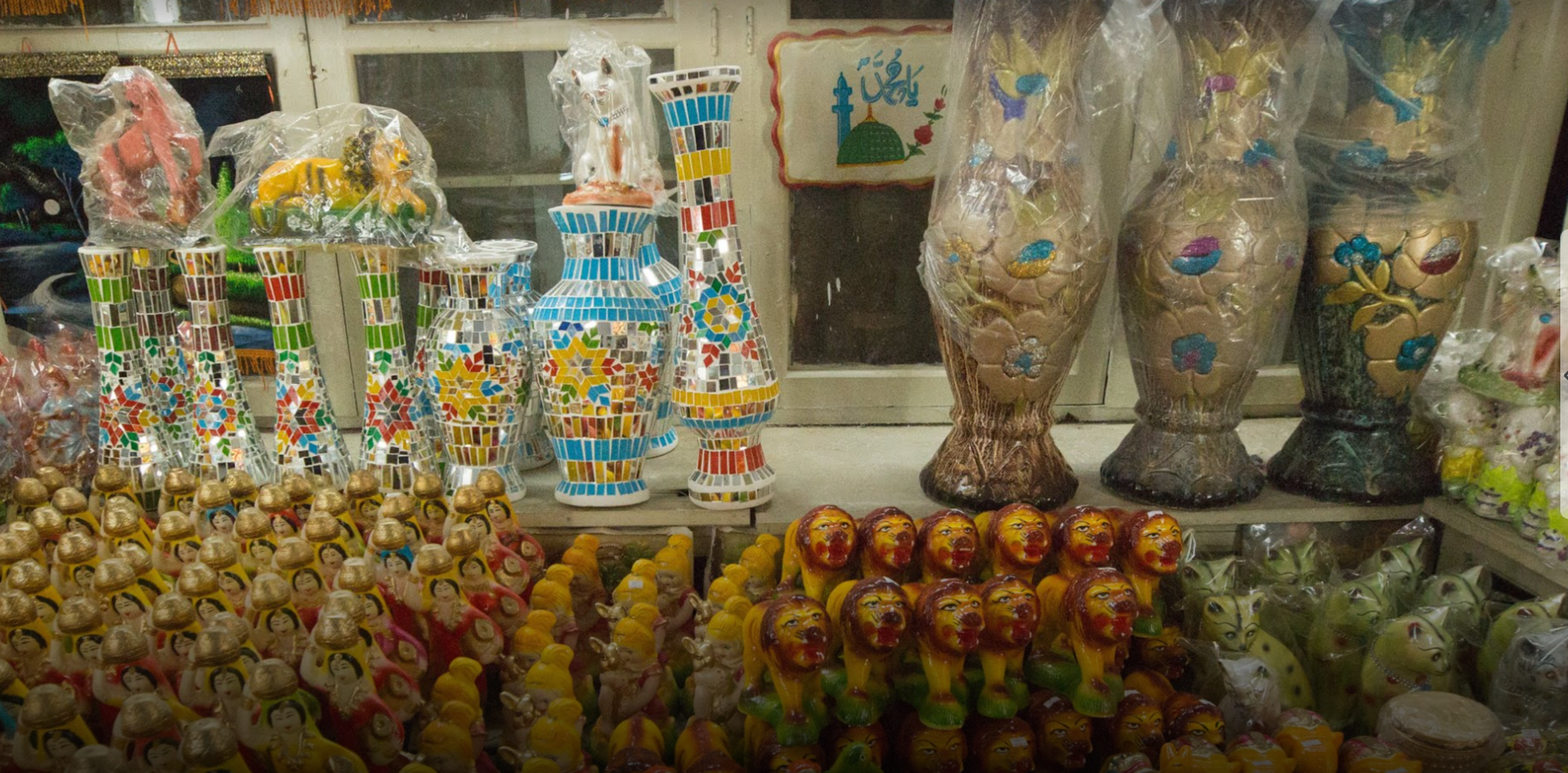 Mirror-mosaic vases and painted figurines